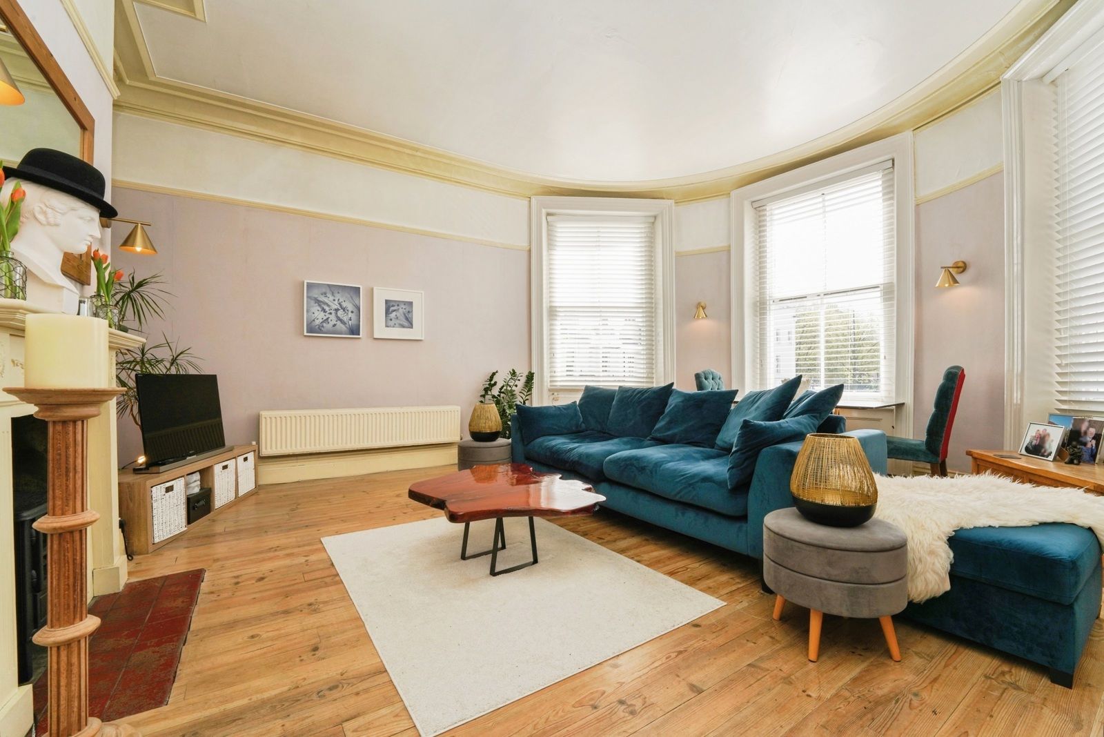 Lounge looking towards the hall door, sofa and television