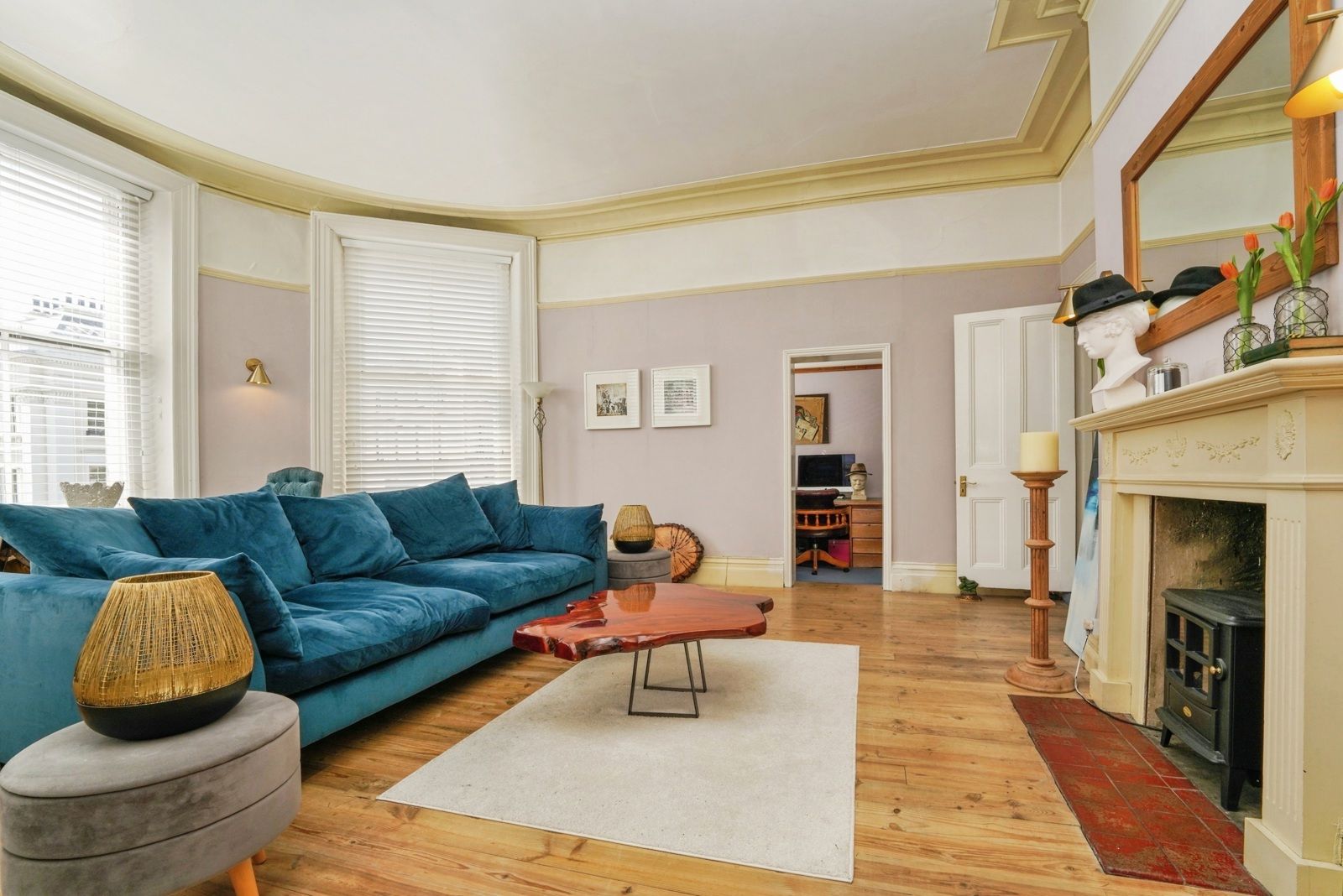 Lounge from the bay looking back towards the fireplace and overmantel mirror